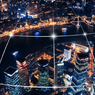 Shanghai at night with a graphic showing connections across the city.